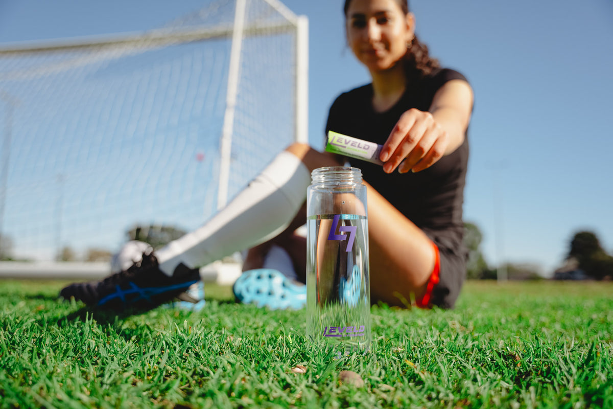 Person holding hydration stick